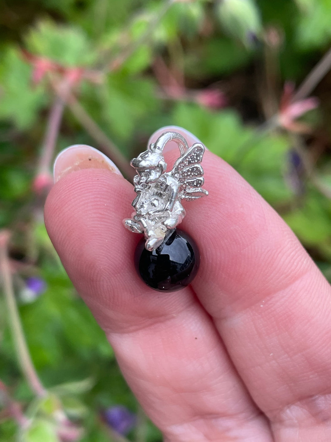 Silver Pixie on a Black Onyx Ball