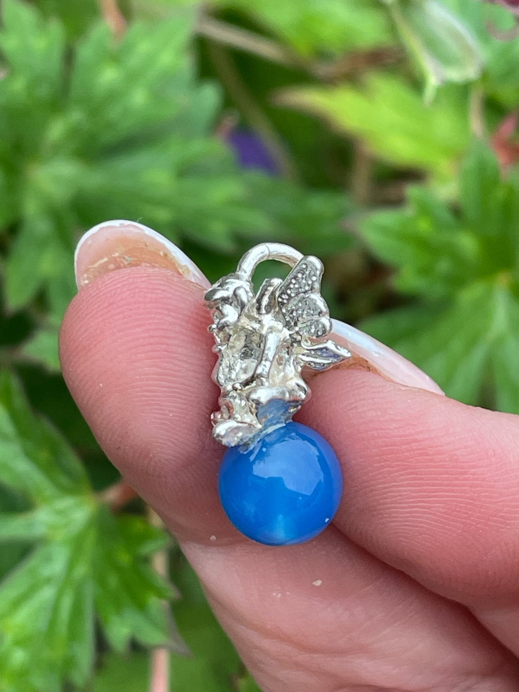 Silver Pixie on a Blue Agate Ball