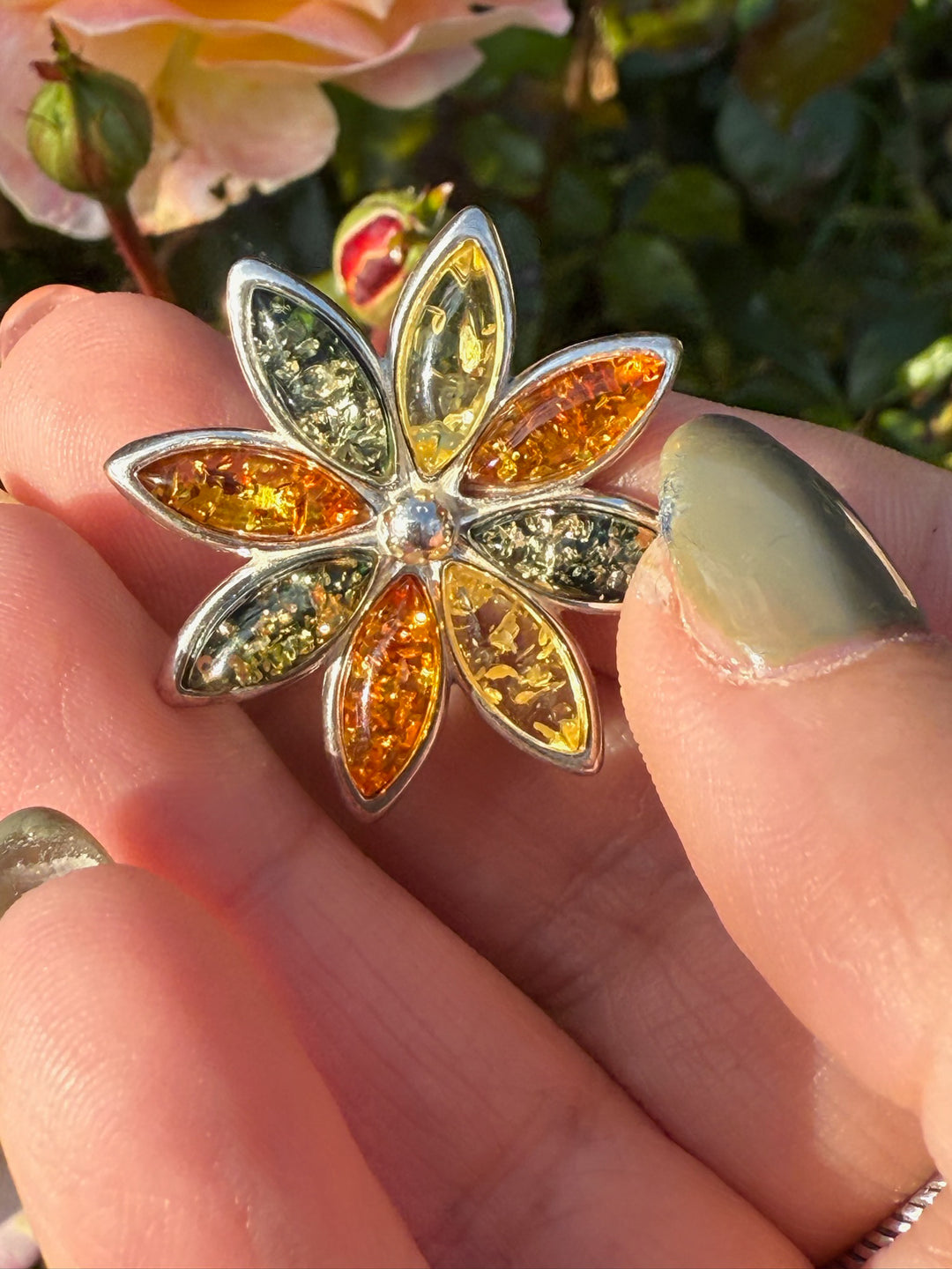 Amber Flower Pendant in Silver with a Concealed Bail
