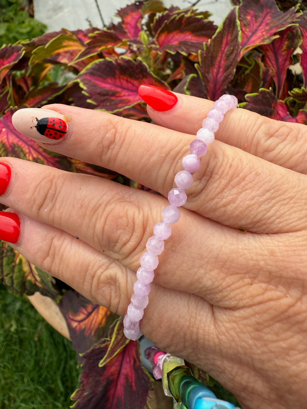 UV Reactive Faceted Kunzite Bracelet 4mm Beads