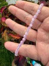 Load image into Gallery viewer, UV Reactive Faceted Kunzite Bracelet 4mm Beads
