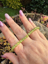 Load image into Gallery viewer, Faceted Peridot Bracelet 4mm Beads
