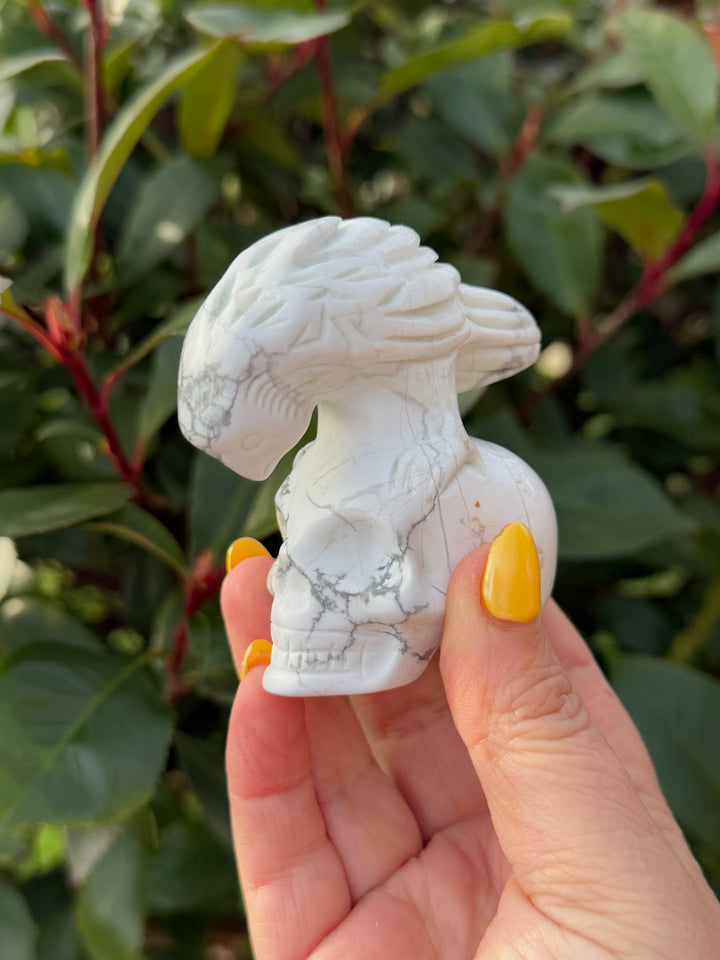 Howlite Skull and Raven Skull Carving