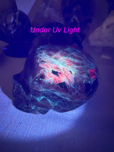 Load image into Gallery viewer, Unusual Uv Reactive Blue Kyanite Skull with Garnet
