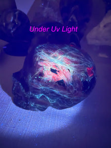 Unusual Uv Reactive Blue Kyanite Skull with Garnet