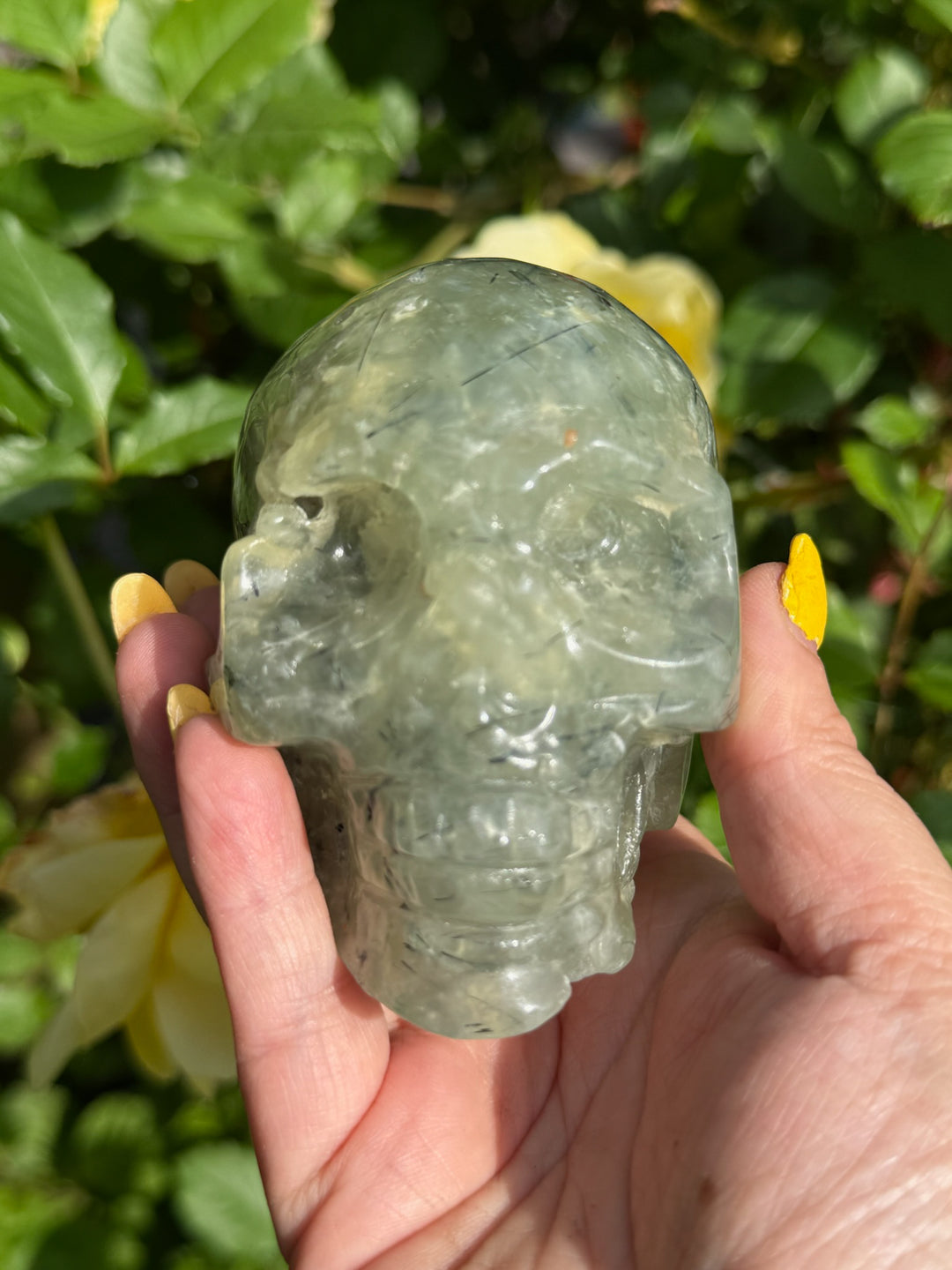 Large Prehnite with Epidote Skull Carving