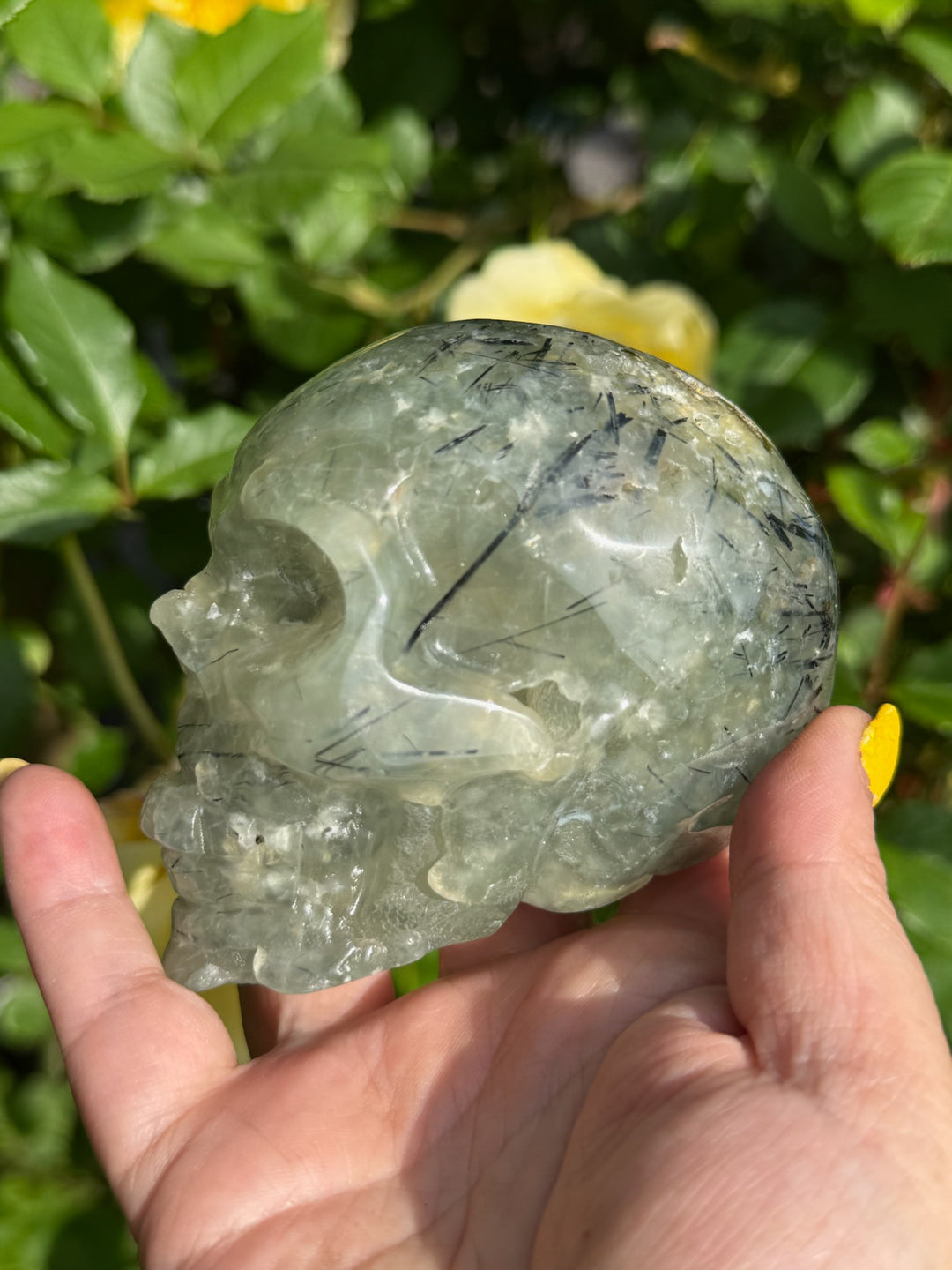 Large Prehnite with Epidote Skull Carving