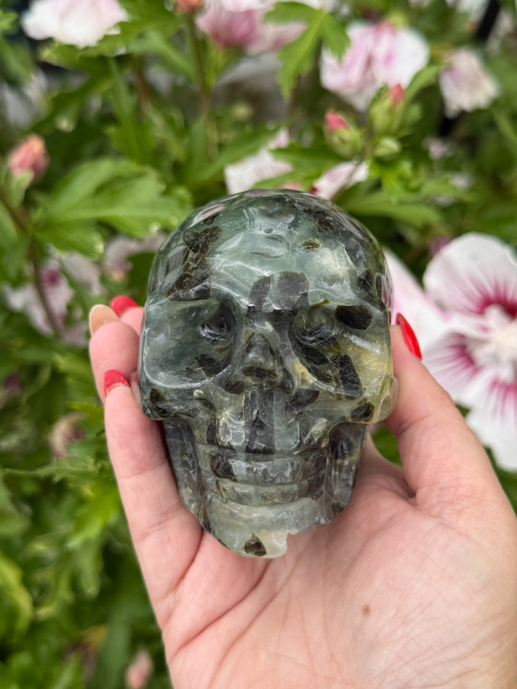 Prehnite and Epidote Skull Carving