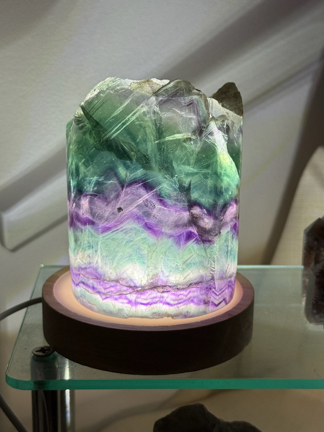 Rainbow Fluorite Tube on Lightbox Carving
