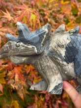 Load image into Gallery viewer, UV Reactive Volcano Agate Dinosaur Triceratops Carving a Statement Piece
