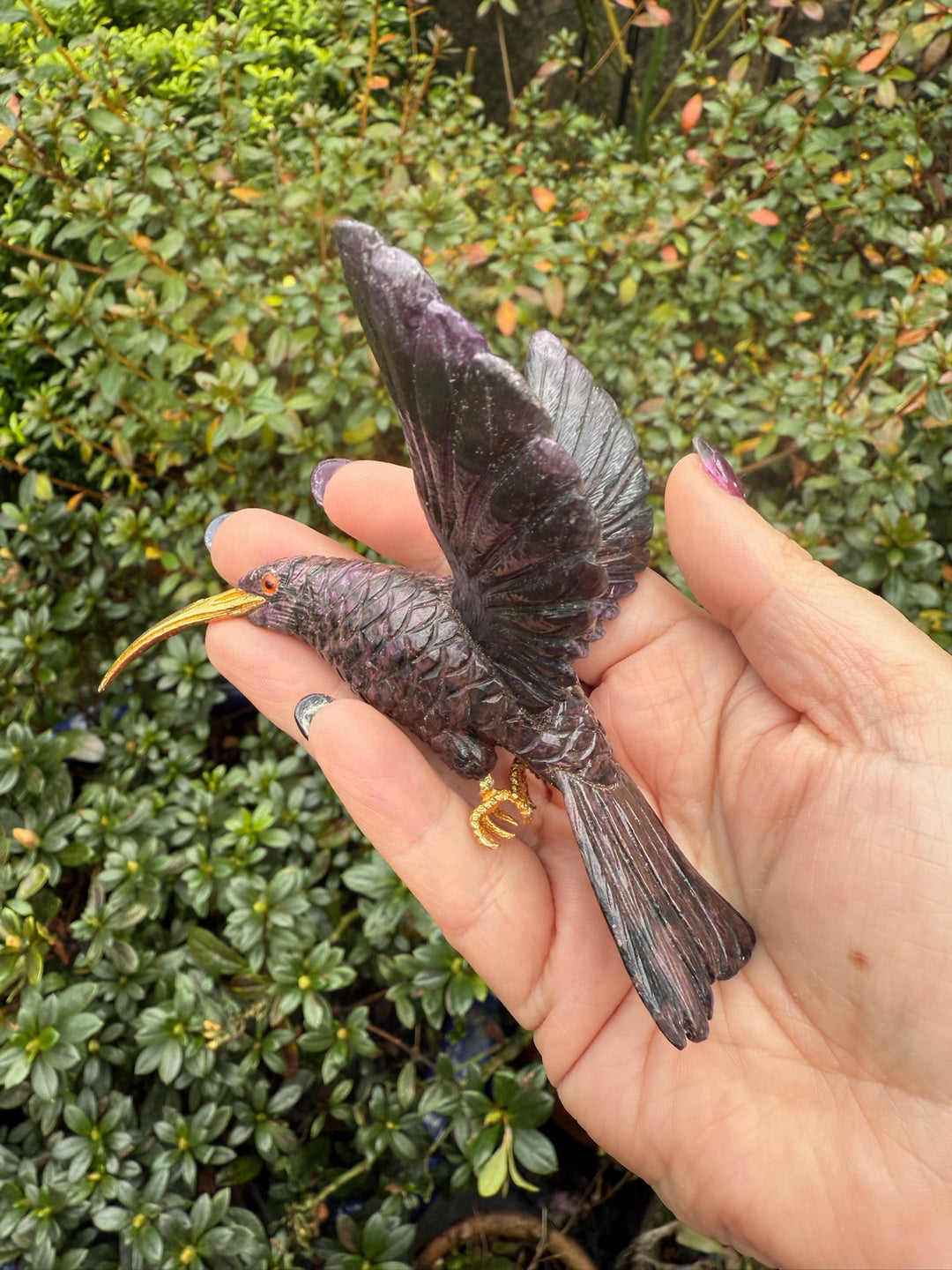 Handcarved Sugilite Humming Bird on a Quartz and Pyrite Base with a Mangano Calcite Flower and Serpentine Petals