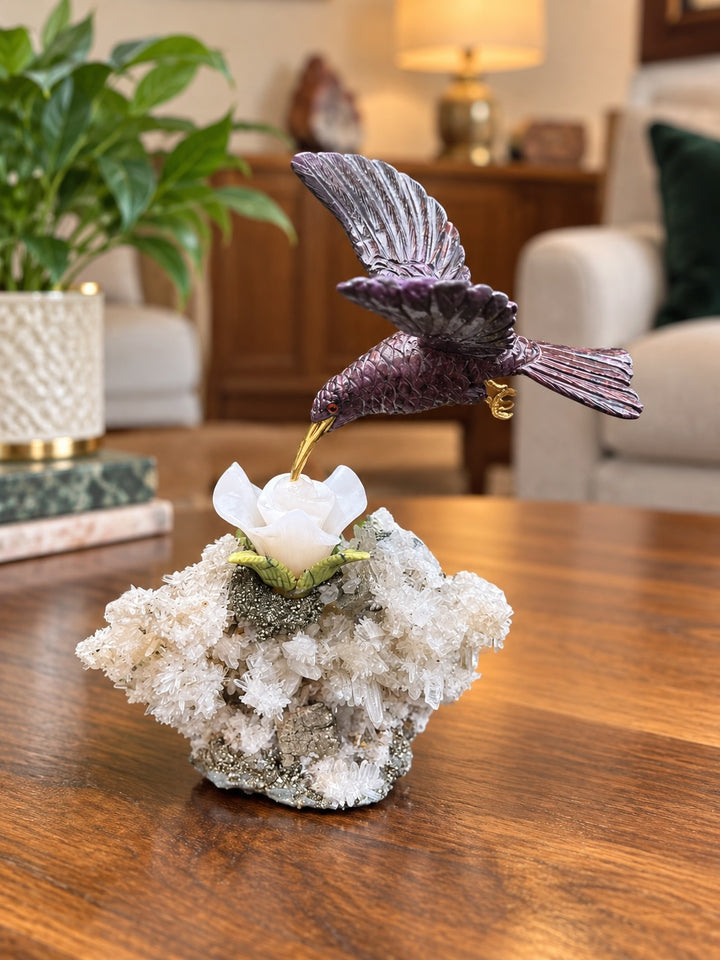 Handcarved Sugilite Humming Bird on a Quartz and Pyrite Base with a Mangano Calcite Flower and Serpentine Petals