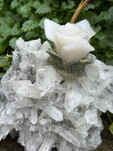 Load image into Gallery viewer, Handcarved Sugilite Humming Bird on a Quartz and Pyrite Base with a Mangano Calcite Flower and Serpentine Petals
