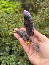 Load image into Gallery viewer, Handcarved Sugilite Humming Bird on a Quartz and Pyrite Base with a Mangano Calcite Flower and Serpentine Petals
