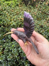 Load image into Gallery viewer, Handcarved Sugilite Humming Bird on a Quartz and Pyrite Base with a Mangano Calcite Flower and Serpentine Petals
