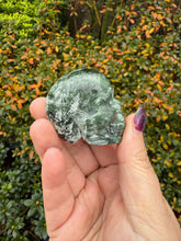 Load image into Gallery viewer, Seraphinite Skull Carving
