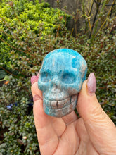Load image into Gallery viewer, Gemmy Apatite and Sunstone Skull Carving
