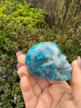 Load image into Gallery viewer, Gemmy Apatite and Sunstone Skull Carving
