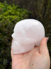 Load image into Gallery viewer, Uv Reactive Pink Calcite Skull Carving
