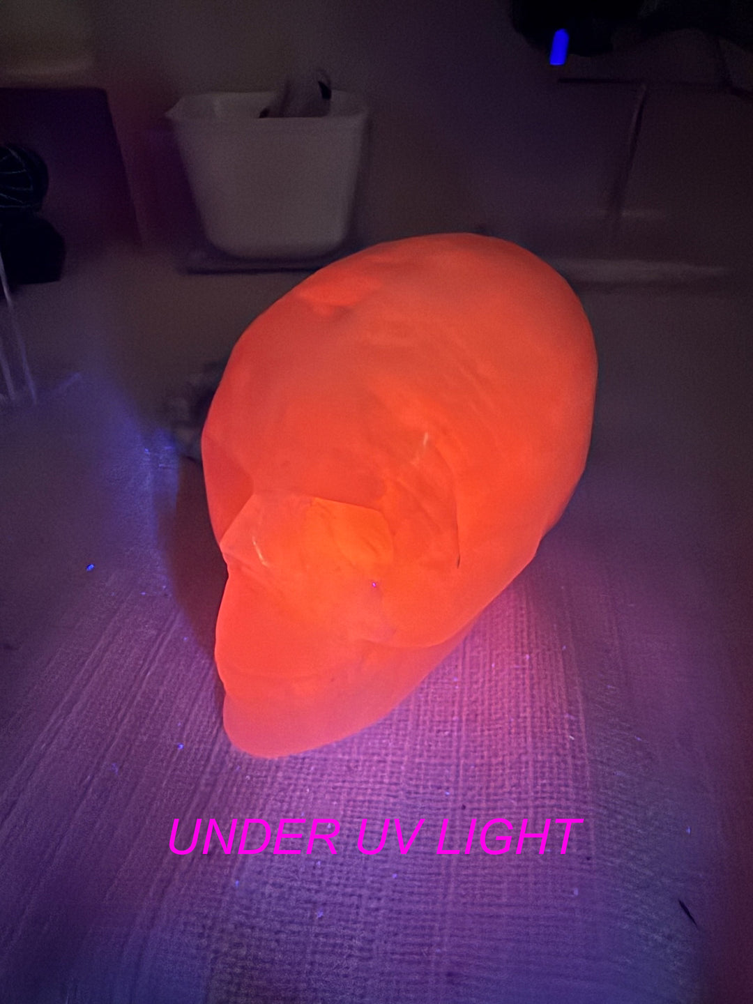 Uv Reactive Pink Calcite Skull Carving