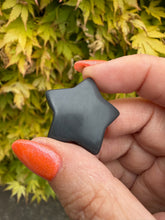 Load image into Gallery viewer, Sert of 4 Obsidian Star Carvings
