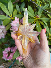 Load image into Gallery viewer, Golden Healer North Star Carving on a Stand
