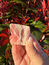 Load image into Gallery viewer, Polished Rhodochrosite Freeform Carving
