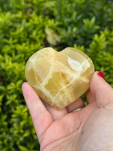 Load image into Gallery viewer, Lemon Calcite Heart Carving
