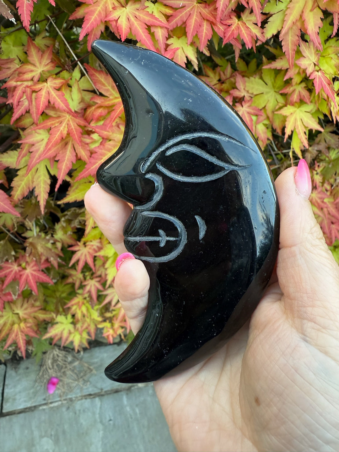 Obsidian Moon with Face Carving on Stand