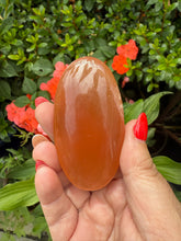 Load image into Gallery viewer, Orange Calcite Palmstone
