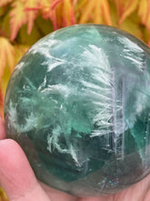 Load image into Gallery viewer, Feather Fluorite Sphere with Scolecite
