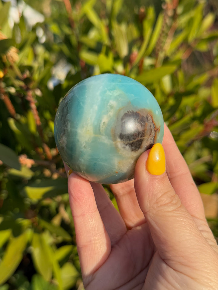 Blue calcite and Tourmaline Sphere