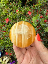 Load image into Gallery viewer, Orange Calcite Sphere 5.6cm
