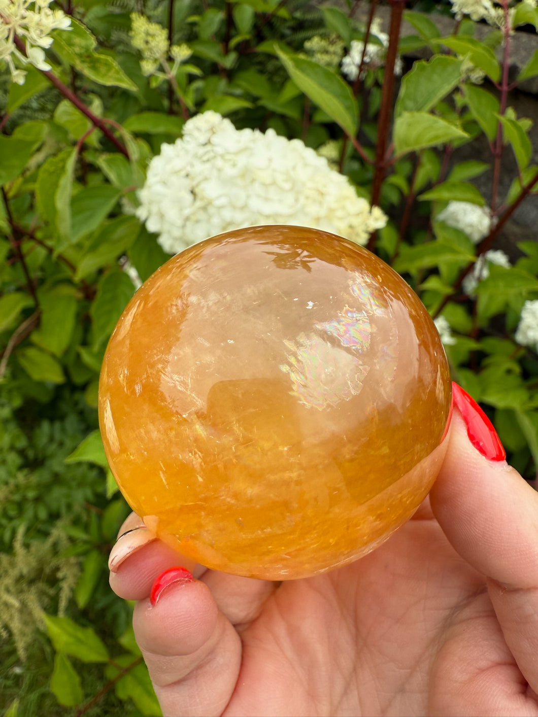 Honey Calcite Sphere with rainbows 5.7cm dia