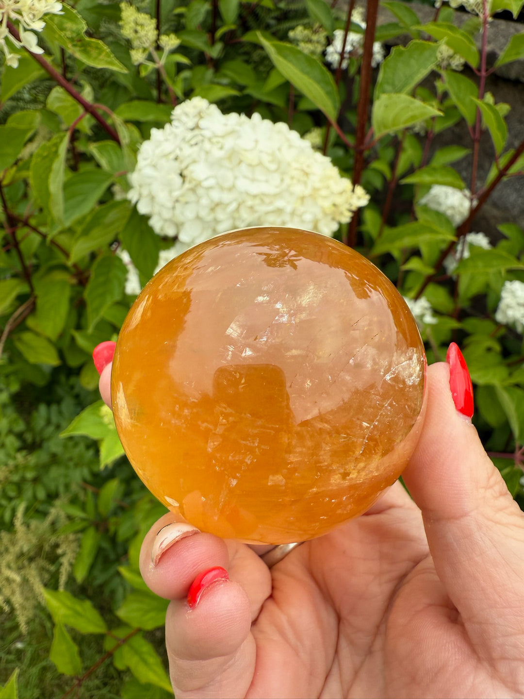 Honey Calcite Sphere with rainbows 5.7cm dia