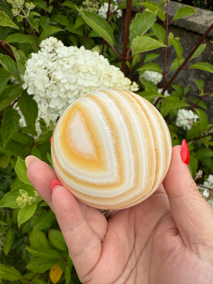 Orange Calcite Sphere 6.7cm dia