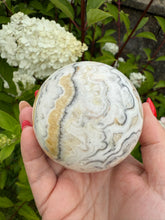Load image into Gallery viewer, Unusual Calcite Sphere 6.8cm dia
