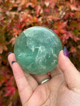 Load image into Gallery viewer, Green Fluorite with Feathers Sphere 6.5cm Diameter
