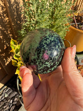 Load image into Gallery viewer, Uv Reactive Ruby in Zoisite Sphere 6cm dia
