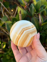Load image into Gallery viewer, Orange Calcite Sphere 6.6cm Dia
