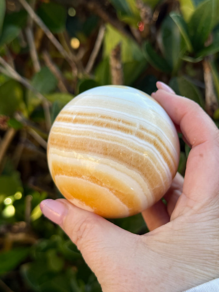Orange Calcite Sphere 6.6cm Dia