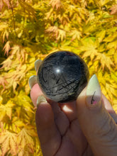 Load image into Gallery viewer, Tourmaline in Quartz Sphere 3cm Dia
