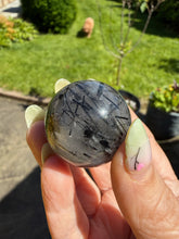 Load image into Gallery viewer, Tourmaline in Quartz Sphere 3cm Dia
