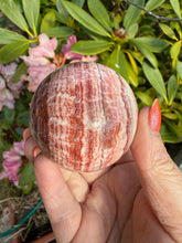 Load image into Gallery viewer, Pink Banded Calcite Sphere 5.5cm Dia
