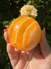 Load image into Gallery viewer, Vibrant Orange Calcite Sphere 6.3cm Dia
