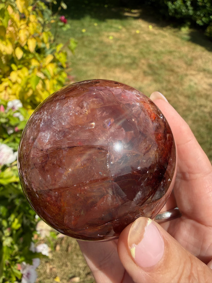 Fire Quartz Sphere with Hematite and Star Flash 6.1cm Dia