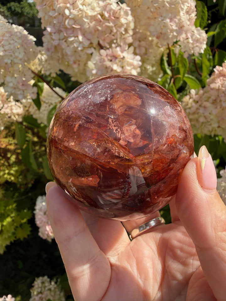 Fire Quartz Sphere with Hematite and Star Flash 6.1cm Dia