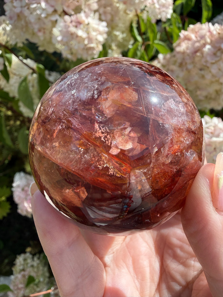 Fire Quartz Sphere with Hematite and Star Flash 6.1cm Dia
