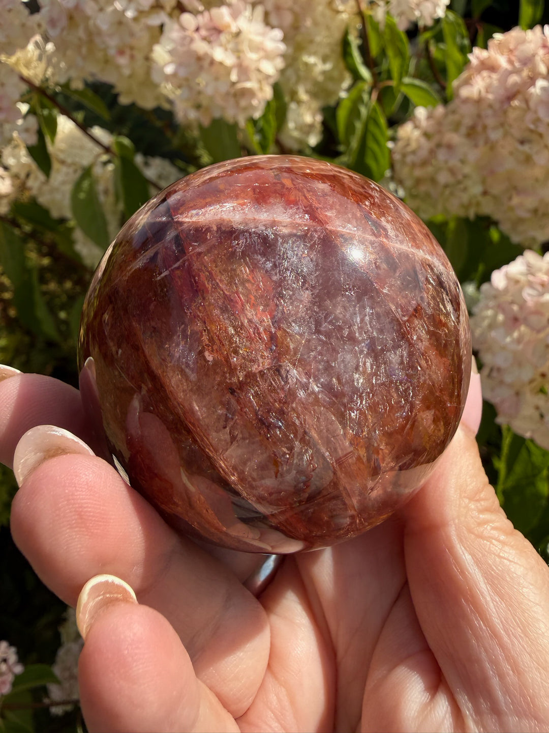 Fire Quartz Sphere with Hematite and Star Flash 6.1cm Dia