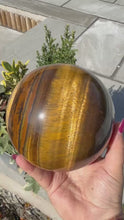 Load and play video in Gallery viewer, Large Tigers Eye Sphere 11cm diameter
